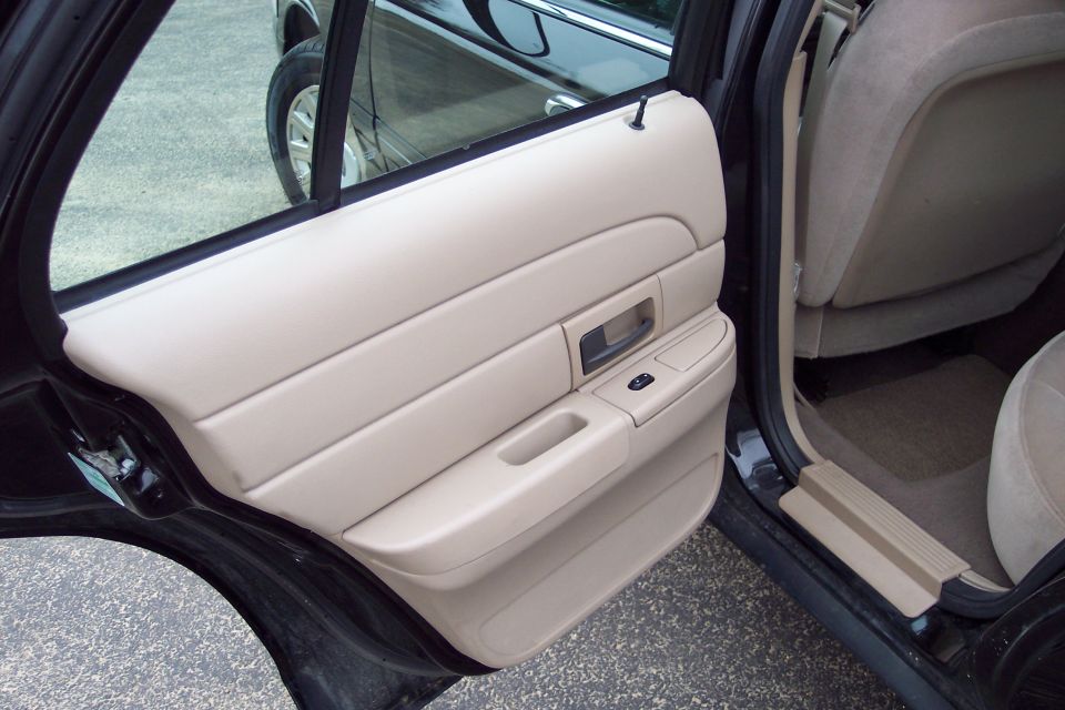 Interior door panel and rear seat of a 2001 Ford Crown Victoria