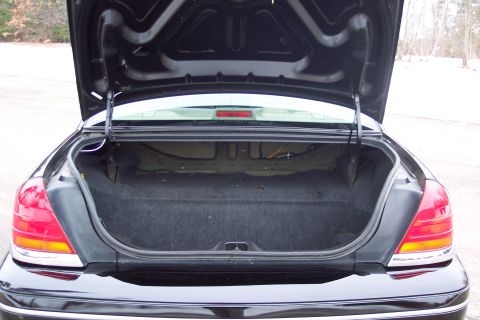 2001 Ford Crown Victoria - Rear view of an open trunk on a 2001 Ford Crown Victoria.