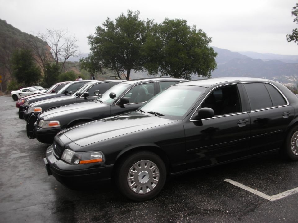Black 1992 Ford Crown Victoria police car, 3/4 front view