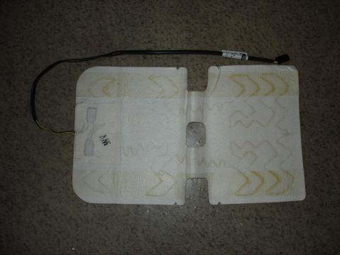 2006 Ford F-350 - A heated seat element is shown, its wiring and a watermark from Supermotors.net.