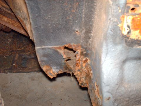 1978 Ford Mustang II - Significant rust damage is visible on this vehicle's structural components.