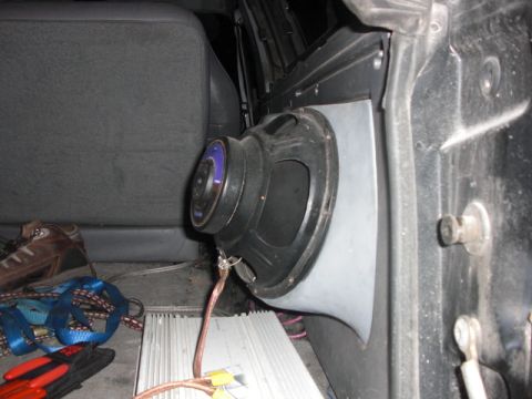 1994 Ford Bronco - Custom speaker and amplifier installation visible inside a vehicle's interior.