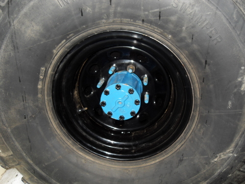 1997 Ford Ranger - A close-up view of a tire and wheel hub assembly.