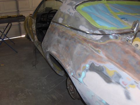 1971 Chevrolet Camaro - This vehicle body is in the process of repair, with visible primer and body filler applied to its surfaces.