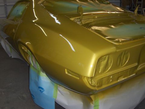 1971 Chevrolet Camaro - Car bodywork in progress, showing a rear quarter panel being prepped for paint.