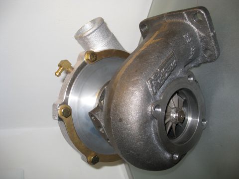 1994 Ford Probe - A turbocharger part is shown against a plain background, with a website watermark at the bottom right.
