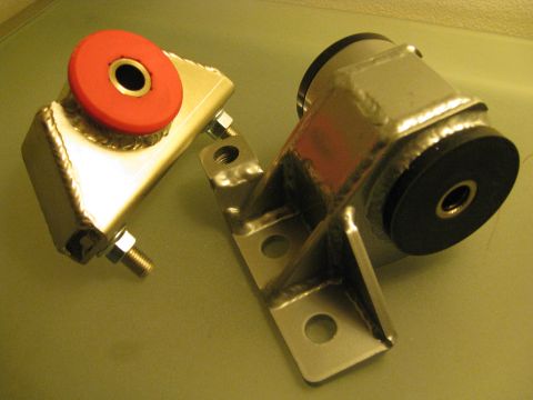 1994 Ford Probe - Aftermarket engine mounts with red and black bushings are shown.