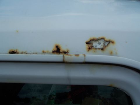 1979 Ford F-250 - The vehicle shows significant rust damage along the upper body panel, indicating potential structural issues.