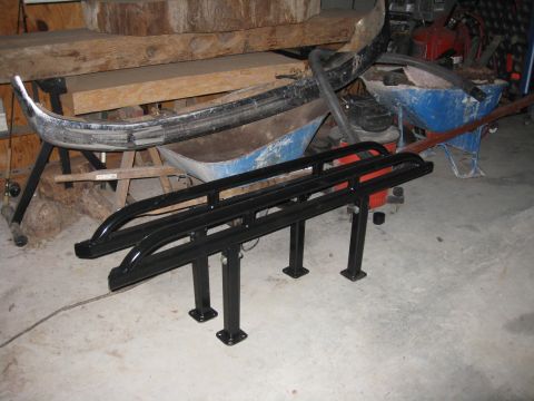 1994 Ford Bronco - Pair of black side steps with square mounting plates, likely for an SUV or truck.