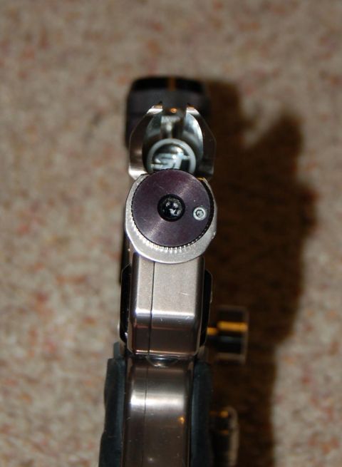 1994 Ford Bronco - This image shows the top view of a paintball marker, a metallic finish and a prominent purple adjustment knob.