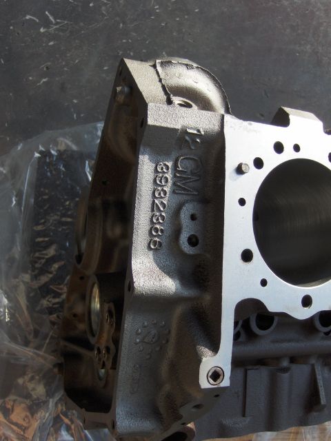 1970 Chevrolet Camaro - Close-up of a GM engine block showing casting marks and a part number.