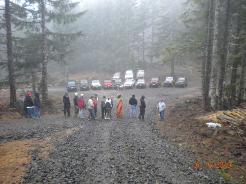 2005 Jeep Wrangler - A gathering of off-road vehicles and people are seen in a misty forest clearing, with a date stamp of 01-16-2010 visible.