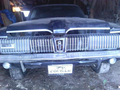 1968 Mercury Cougar front grille with a "COUGAR" badge and "1968" text