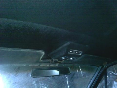 1968 Mercury Cougar - Interior view of a 1968 Mercury Cougar, showing the overhead console and rearview mirror.