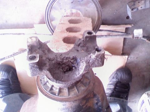 1996 Ford Bronco - Close-up of a differential part, likely from a Sterling 10.25 axle, showing wear and tear.
