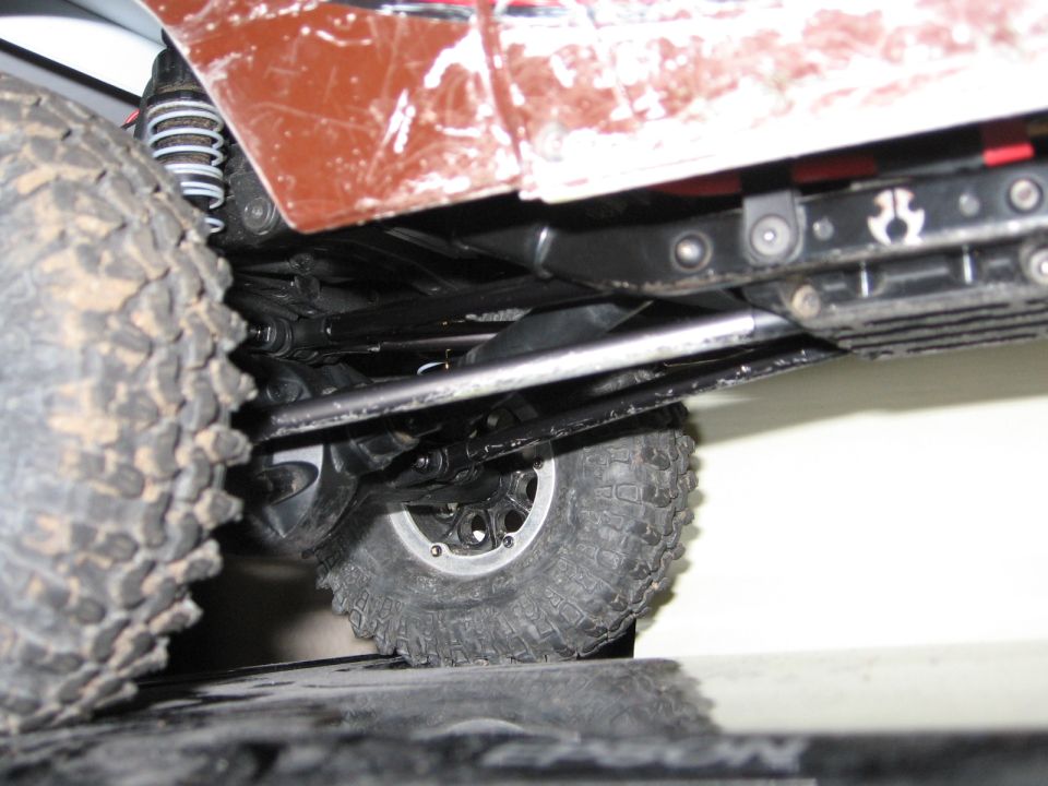 Close-up of the undercarriage and tires of a toy truck