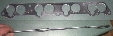 1997 Ford Taurus - Intake manifold gasket for a vehicle, shown from two angles.