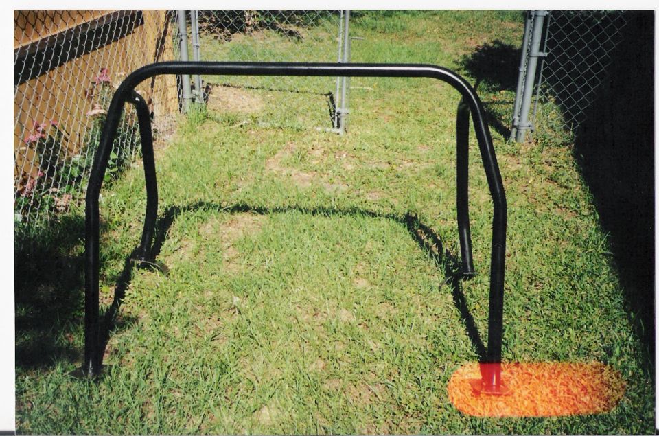 black roll cage on grass