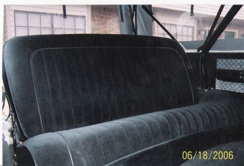 1979 Ford Bronco - The plush velour seats and diamond plate accents suggest a custom interior.