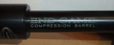 1978 Chevrolet C/K Pickup - A close-up view of a black metal barrel with engraved text and a Supermotors logo at the bottom.