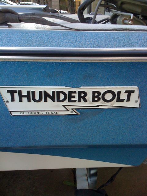 1968 Ford Mustang - Detail of a blue boat with a "THUNDER BOLT" decal, indicating it is from Cleburne, Texas.