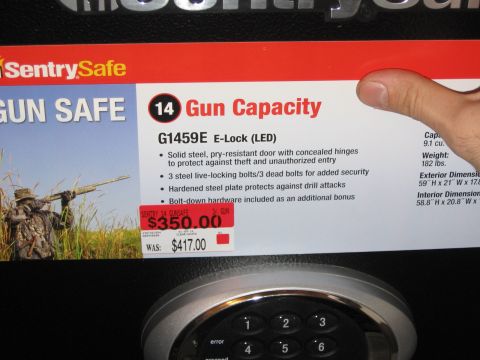2001 Ford F-150 - Packaging for a SentrySafe G1459E E-Lock gun safe, including a price tag and product details.
