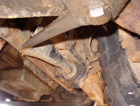 1993 Ford Bronco - Pretzel. The radius arm bracket & frame are also damaged.