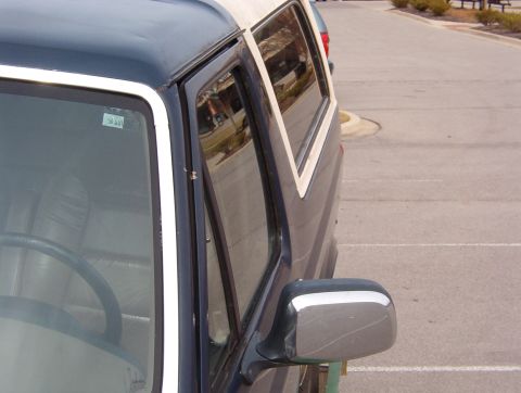 1993 Ford Bronco - I hope this is strictly door damage - I don't want to have to change the body tub.
