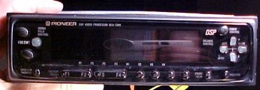 1999 Ford Taurus - A Pioneer car stereo unit is shown, DSP and various control buttons.