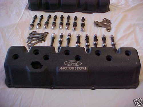 Ford Motorsport valve cover with bolts and gaskets laid out
