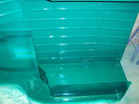 1948 Jeep Wrangler - Close-up of a teal interior panel, possibly from a vehicle undergoing restoration.