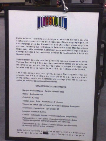 1991 Ford LTD Crown Victoria - French museum exhibit placard describing a Cadillac camera-car, including a 'Caracteristiques Techniques' specification list.