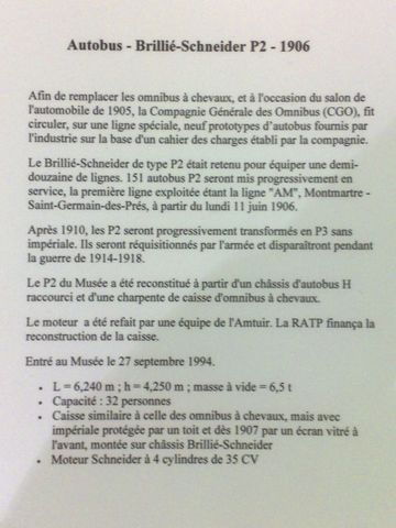 1991 Ford LTD Crown Victoria - Museum information placard (in French) describing a 1906 Brillie-Schneider P2 autobus; not a vehicle technical document.