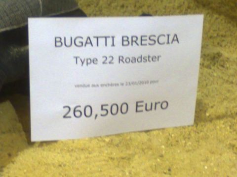 1991 Ford LTD Crown Victoria - Auction result placard for a Bugatti Brescia Type 22 Roadster; a display sign, not a vehicle technical document.