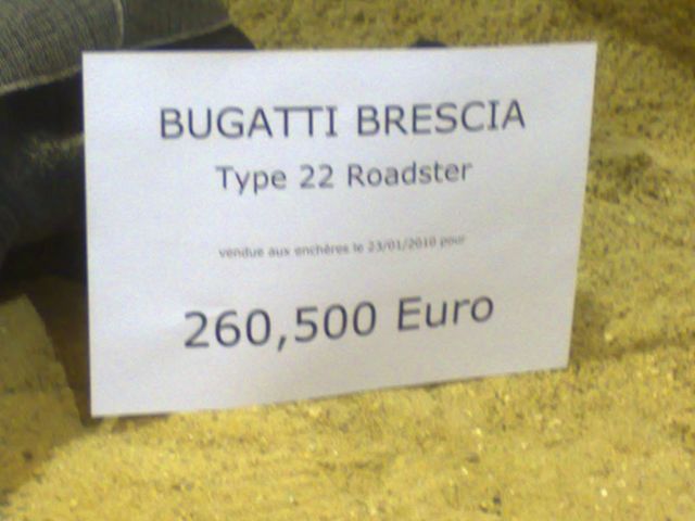Auction placard reading Bugatti Brescia Type 22 Roadster sold for 260,500 Euro