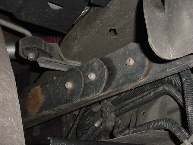 Bottom of right side front of spring