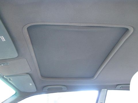 1994 Ford Probe - Close-up view of the interior sunroof and sun visors.