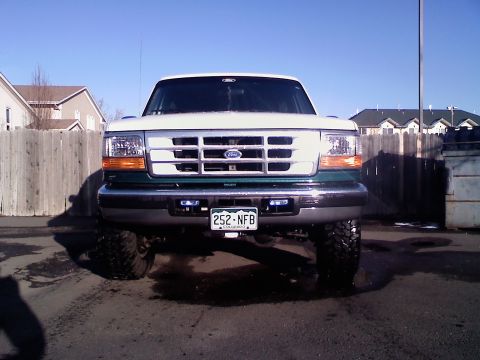 1996 Ford Bronco - This Ford F-Series truck, likely from the early to mid-1990s, features a distinctive grille and front-end design.