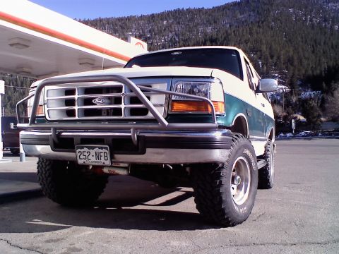 1996 Ford Bronco - This 1996 Ford Bronco is equipped with a bull bar and large off-road tires.