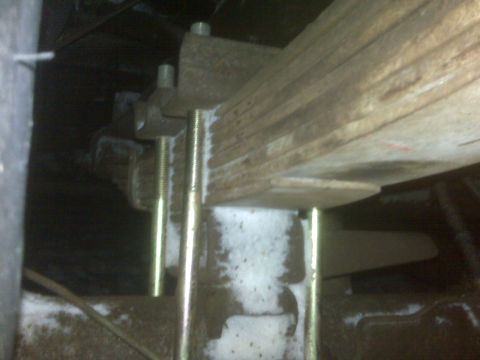 1994 Ford F-150 - Leaf spring assembly with U-bolts and hardware visible.