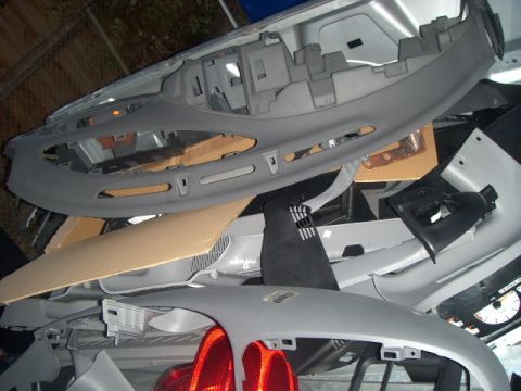 2007 Ford Mustang - Various car interior components are piled together, obscuring any specific vehicle identification.