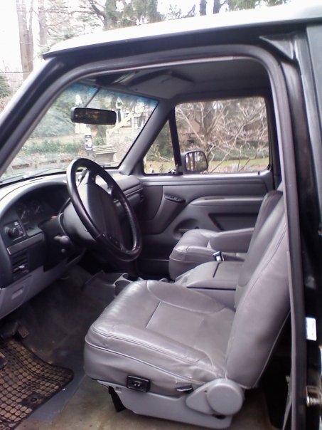1994 Ford Bronco - Interior view of a 1994 Ford Bronco, highlighting the seats and dashboard.