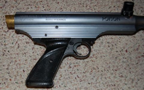 1994 Ford Bronco - This air gun has "POISON" printed on its side and a brass barrel end.