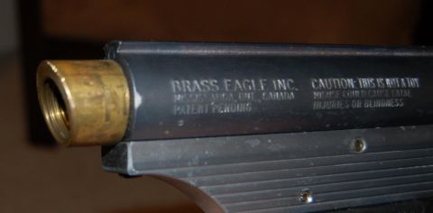 1994 Ford Bronco - The barrel of a toy gun is shown, with warnings about misuse printed on its side.