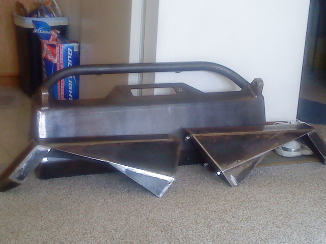 Aftermarket steel fenders and bumper assembly, possibly for an off-road vehicle