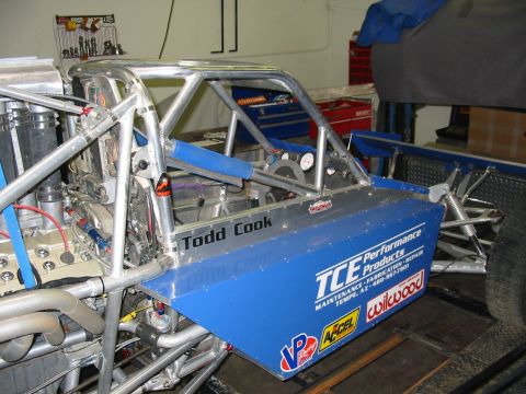 1993 Ford Taurus - Custom race car with "Todd Cook" and "TCE Performance Products" visible on the blue side panel.