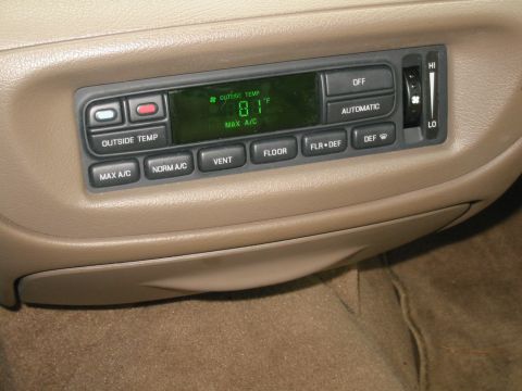 1998 Ford Crown Victoria - The digital display shows the outside temperature and the current air conditioning setting.