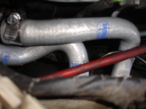 1993 Ford Taurus - Engine hoses with blue markings are visible in the engine bay.