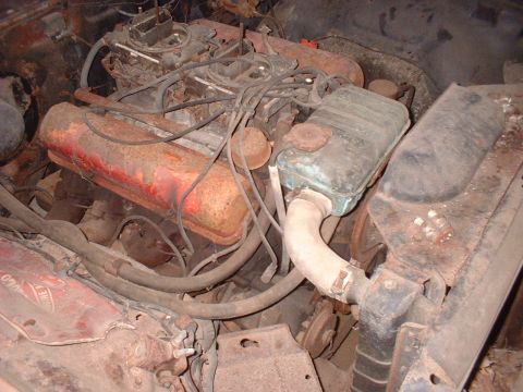 1963 Ford Galaxie - Close-up view of a V8 engine compartment showing signs of age and rust.