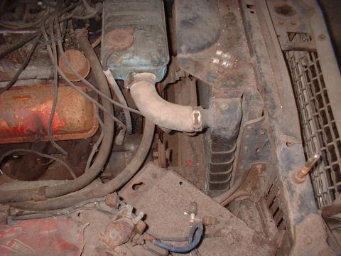 1963 Ford Galaxie - Close-up view of the engine bay, focusing on the radiator and associated hoses.